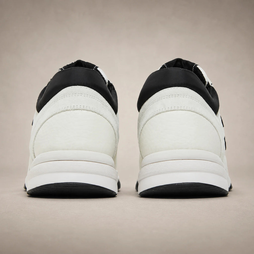 Chanel Runner — Blanc / Noir