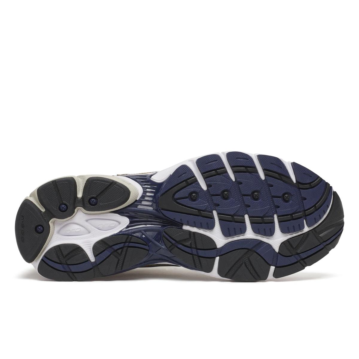 Saucony ProGrid Omni 9 — Blanc / Beige / Marine